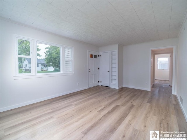 413 Chautauqua Ave, Jamestown, NY 14701 - unfurnished room featuring light wood finished floors and baseboards