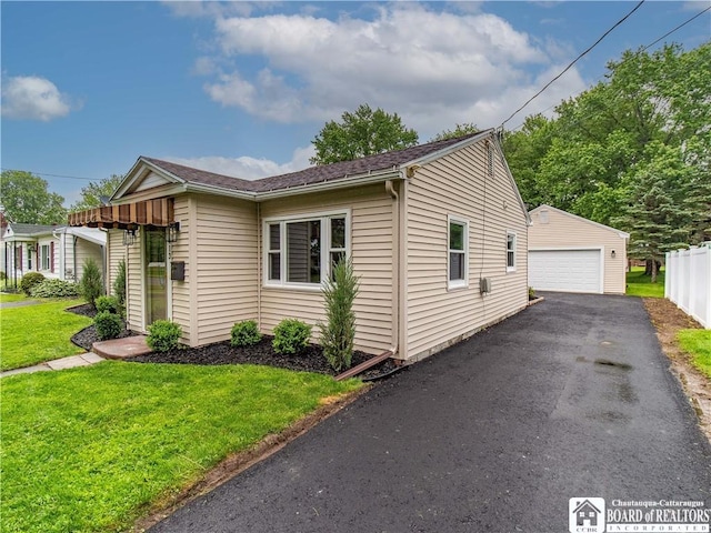 413 Chautauqua Ave, Jamestown, NY 14701 - view of front of property featuring a garage, an outbuilding, and a front yard