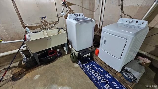 76 Sandra Dr, Cheektowaga, NY 14225 - laundry room featuring washing machine and dryer and concrete block wall
