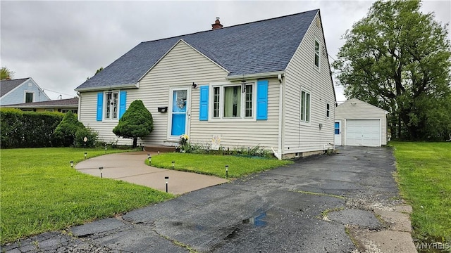76 Sandra Dr, Cheektowaga, NY 14225 - view of front of house with an outbuilding, a detached garage, a front yard, roof with shingles, and a chimney