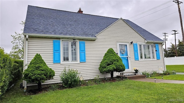 76 Sandra Dr, Cheektowaga, NY 14225 - view of front of house featuring a shingled roof and a chimney