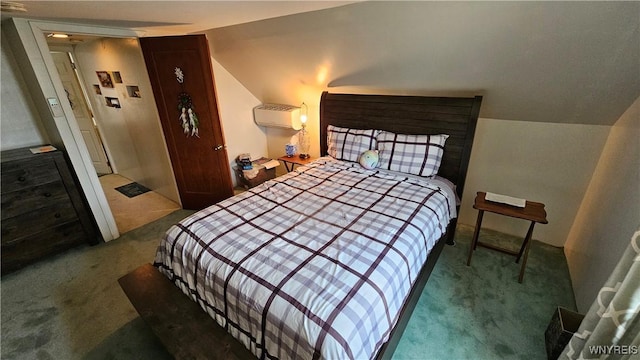 76 Sandra Dr, Cheektowaga, NY 14225 - bedroom with carpet floors, an AC wall unit, and vaulted ceiling