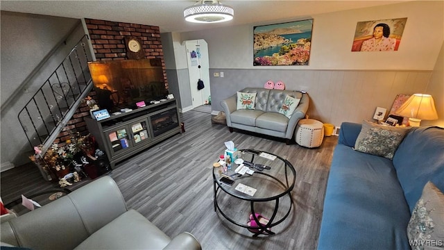 76 Sandra Dr, Cheektowaga, NY 14225 - living room featuring wood finished floors, baseboards, and stairway