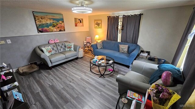76 Sandra Dr, Cheektowaga, NY 14225 - living area with wood finished floors, wainscoting, and wooden walls
