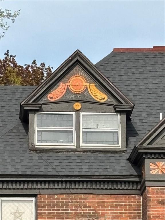 110 Edgar James St, Kane Boro, PA 16735 - exterior view of brick siding and roof with shingles