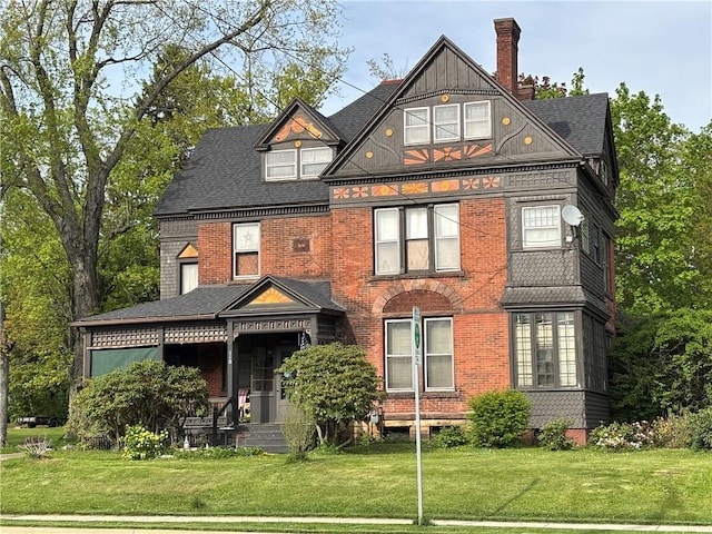 110 Edgar James St, Kane Boro, PA 16735 - back of house featuring a yard, a chimney, and brick siding