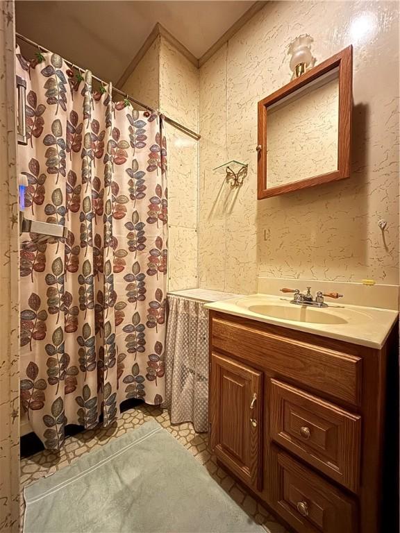 110 Edgar James St, Kane Boro, PA 16735 - bathroom with vanity and a shower with shower curtain