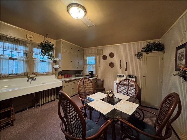 110 Edgar James St, Kane Boro, PA 16735 - dining space with dark colored carpet and wallpapered walls