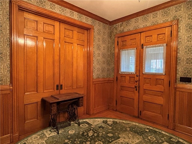 110 Edgar James St, Kane Boro, PA 16735 - foyer entrance featuring a wainscoted wall, wallpapered walls, and crown molding