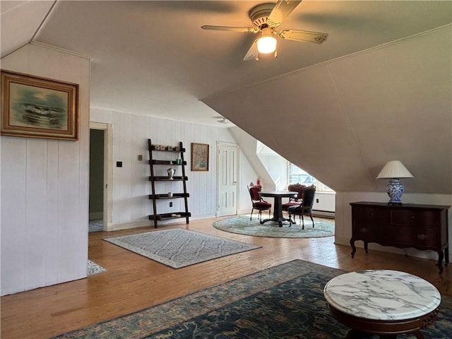 110 Edgar James St, Kane Boro, PA 16735 - sitting room featuring wood finished floors, vaulted ceiling, a ceiling fan, and baseboard heating