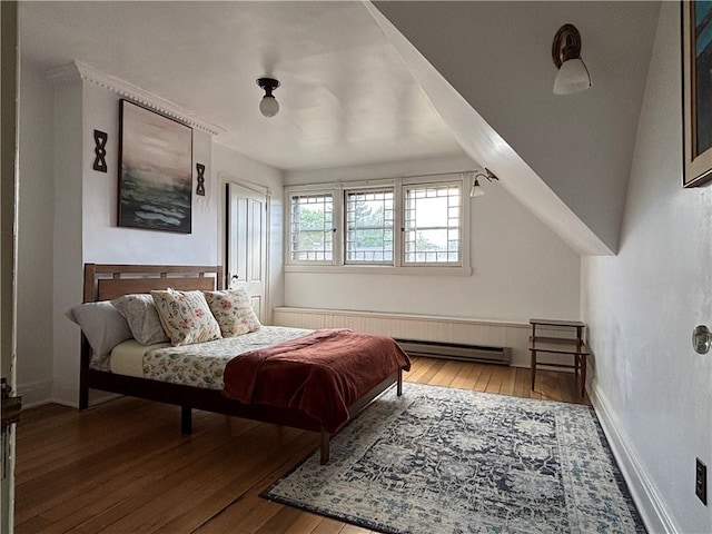 110 Edgar James St, Kane Boro, PA 16735 - bedroom featuring hardwood / wood-style flooring, baseboards, and a baseboard radiator