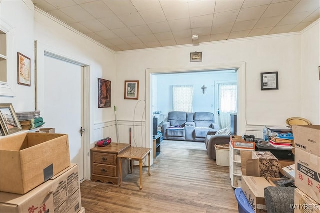 125 7th Ave, North Tonawanda, NY 14120 - hall featuring ornamental molding, light wood-style floors, and wainscoting