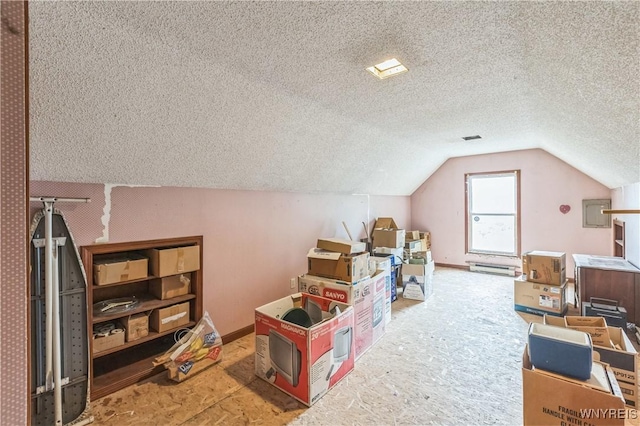 125 7th Ave, North Tonawanda, NY 14120 - bonus room featuring vaulted ceiling, baseboards, a textured ceiling, and carpet