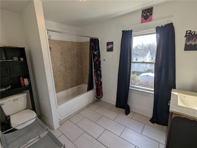 313 Ellicott St, Rochester, NY 14619 - full bath featuring toilet, healthy amount of natural light, vanity, and shower / tub combo