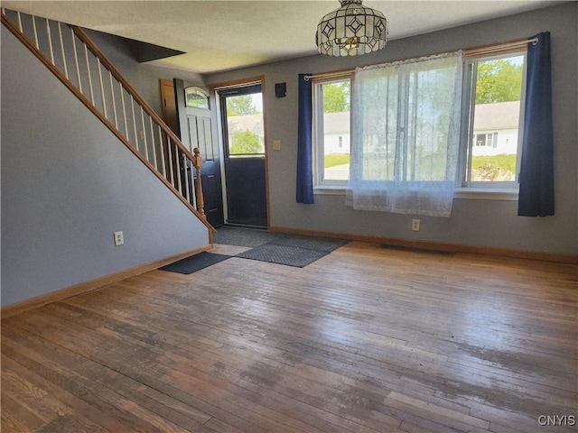 116 Kendall Dr E, Manlius, NY 13057 - entryway featuring hardwood / wood-style floors, baseboards, and stairway