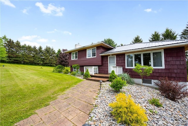 3232 Lyon Rd, Nelson, NY 13035 - split level home featuring a front lawn, metal roof, and a chimney
