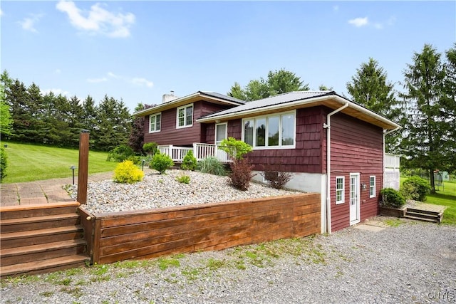 3232 Lyon Rd, Nelson, NY 13035 - tri-level home featuring a chimney and a wooden deck