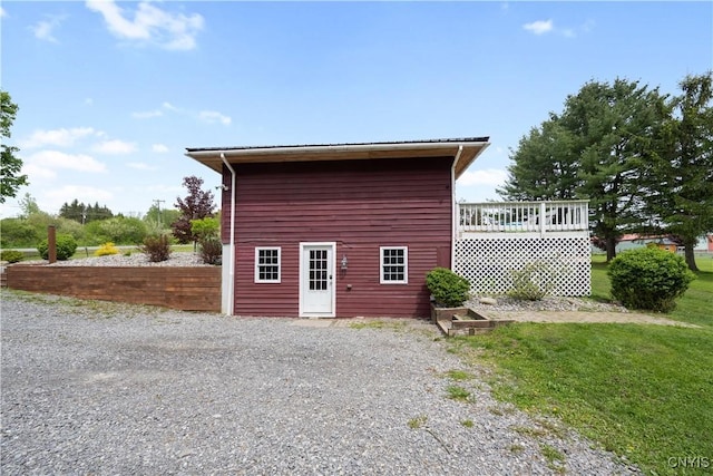 3232 Lyon Rd, Nelson, NY 13035 - view of property exterior featuring a wooden deck and a yard