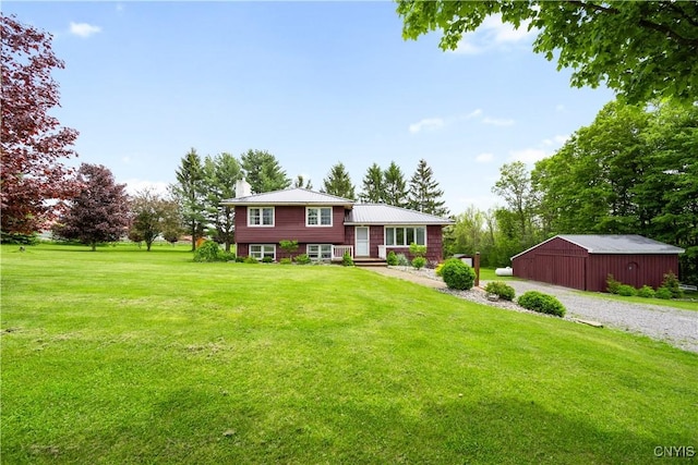 3232 Lyon Rd, Nelson, NY 13035 - split level home with a front lawn, an outbuilding, a pole building, a chimney, and metal roof