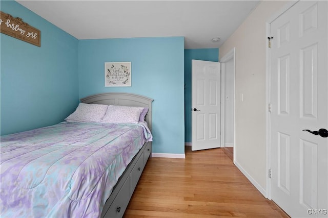 3232 Lyon Rd, Nelson, NY 13035 - bedroom featuring light wood-style flooring and baseboards