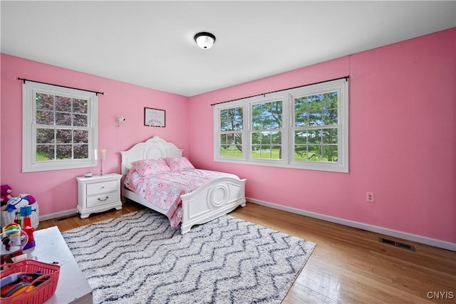 3232 Lyon Rd, Nelson, NY 13035 - bedroom featuring baseboards and wood finished floors