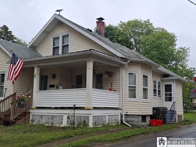 38 Douglas Pl, Jamestown, NY 14701 - bungalow-style home with a chimney, a porch, and roof with shingles