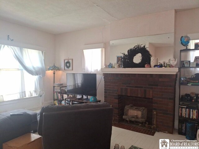 38 Douglas Pl, Jamestown, NY 14701 - living room with a brick fireplace