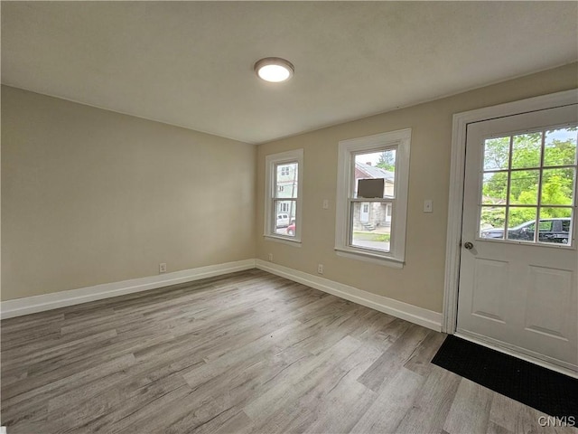11 Bryant St, Utica, NY 13502 - foyer with wood finished floors and baseboards