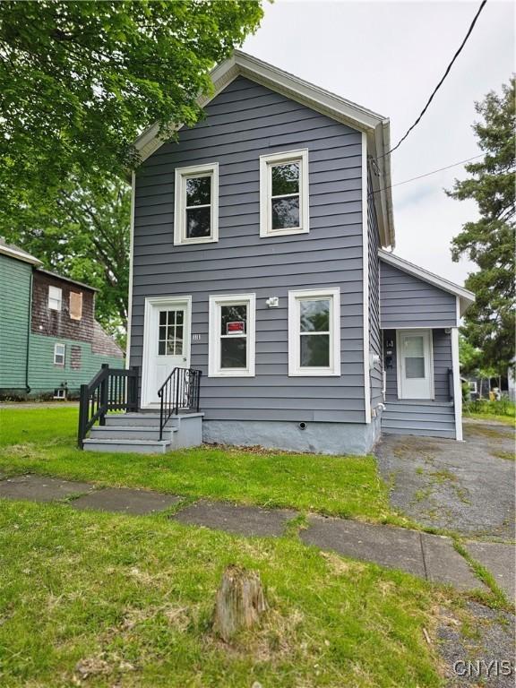 11 Bryant St, Utica, NY 13502 - rear view of house with a yard