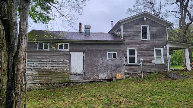 7978 Tuttle Rd, Prattsburgh, NY 14873 - back of property with a yard and a chimney