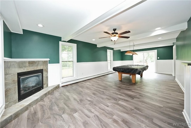 5002 Armor Duells Rd, Orchard Park, NY 14127 - rec room featuring a baseboard heating unit, beam ceiling, wainscoting, pool table, and a tiled fireplace