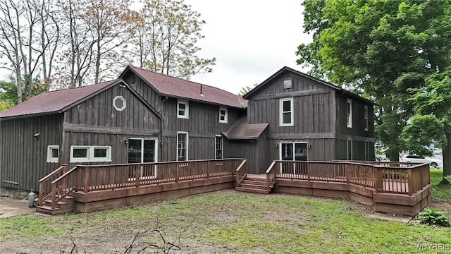 5002 Armor Duells Rd, Orchard Park, NY 14127 - rear view of house featuring a deck and roof with shingles