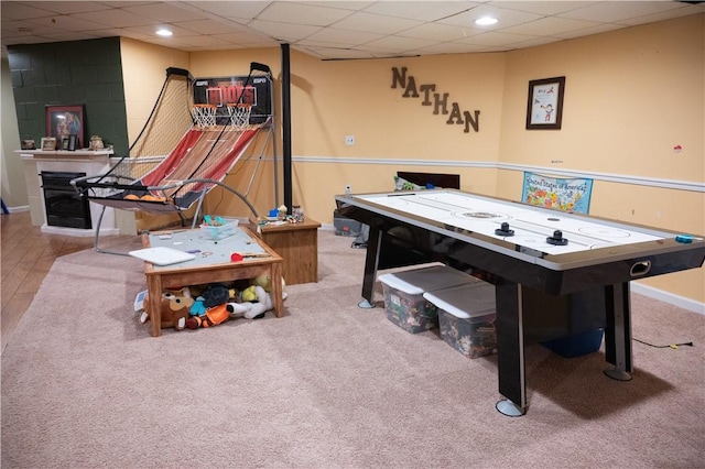 490 Bennett Pkwy, Hornellsville, NY 14843 - game room featuring carpet flooring, a paneled ceiling, baseboards, and a fireplace