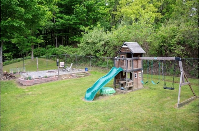 490 Bennett Pkwy, Hornellsville, NY 14843 - view of jungle gym with an outdoor fire pit and a forest view