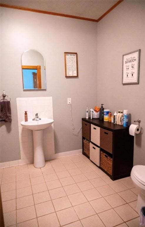 490 Bennett Pkwy, Hornellsville, NY 14843 - bathroom featuring ornamental molding and tile patterned floors
