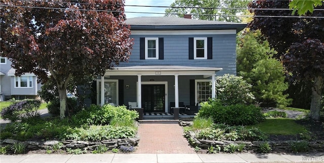 34 Maple St, Ellery, NY 14712 - view of front facade with covered porch and a chimney