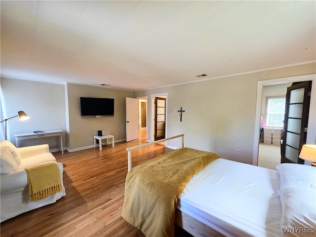 34 Maple St, Ellery, NY 14712 - bedroom featuring light wood-style flooring, crown molding, and baseboards