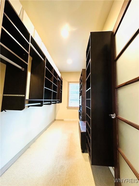 34 Maple St, Ellery, NY 14712 - walk in closet featuring light colored carpet