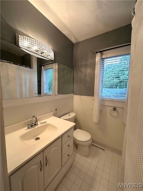 34 Maple St, Ellery, NY 14712 - bathroom with tile patterned floors, vanity, and toilet