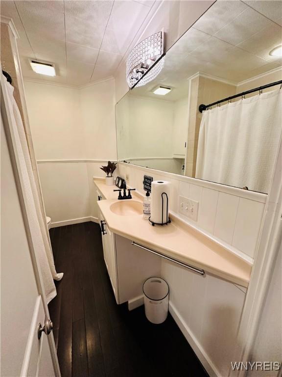 34 Maple St, Ellery, NY 14712 - full bath with vanity, hardwood / wood-style floors, toilet, ornamental molding, and curtained shower