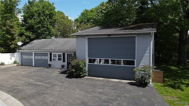 34 Maple St, Ellery, NY 14712 - view of front of property featuring an outdoor structure and a detached garage