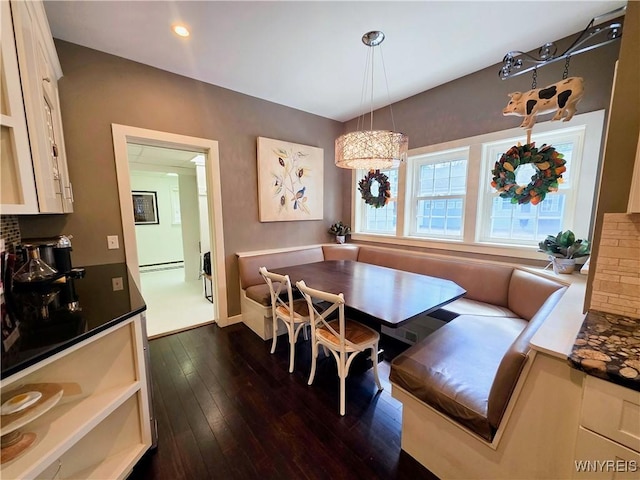 34 Maple St, Ellery, NY 14712 - dining space with breakfast area, dark wood-style flooring, baseboards, and a baseboard heating unit
