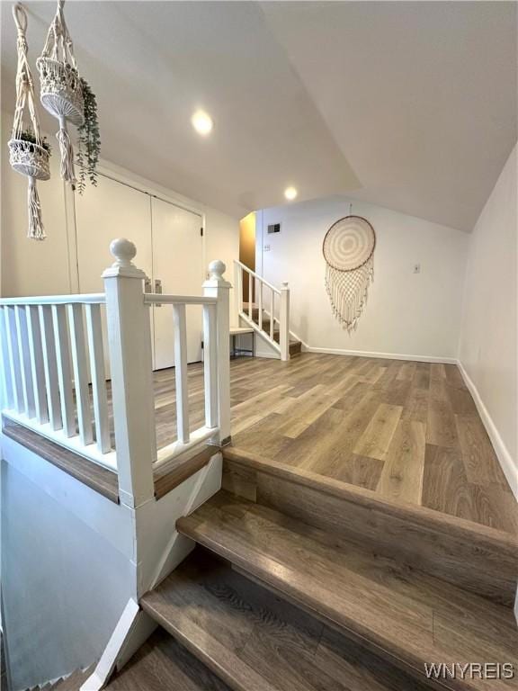34 Maple St, Ellery, NY 14712 - stairway featuring lofted ceiling, wood finished floors, recessed lighting, and baseboards