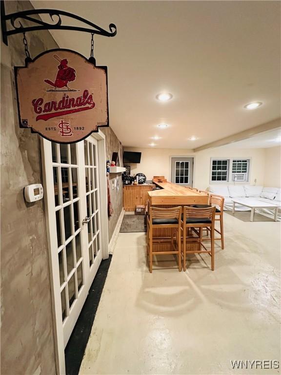34 Maple St, Ellery, NY 14712 - dining area featuring concrete flooring, recessed lighting, and french doors