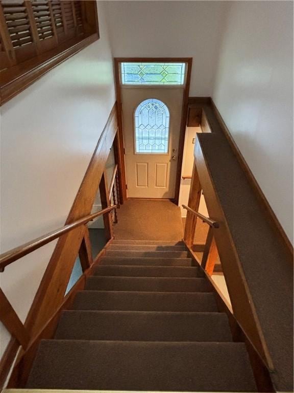606 County Highway 12, Laurens, NY 13796 - staircase with carpet