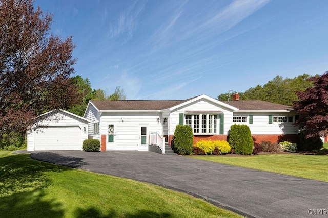 299 Sharp Rd, Granby, NY 13069 - ranch-style home with an outbuilding, a front lawn, asphalt driveway, and brick siding