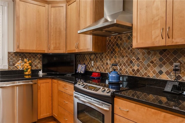 3104 Knoll Rd, Erwin, NY 14870 - kitchen with stainless steel appliances, wall chimney range hood, decorative backsplash, and dark stone countertops