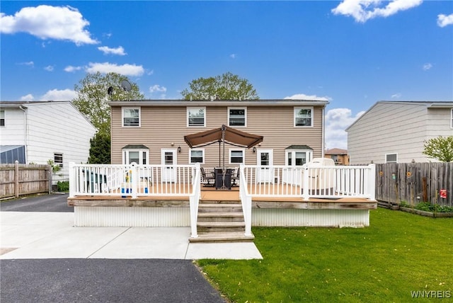 195 Robert Dr, North Tonawanda, NY 14120 - back of house featuring a deck and a patio