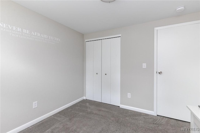 195 Robert Dr, North Tonawanda, NY 14120 - unfurnished bedroom featuring carpet flooring, baseboards, and a closet