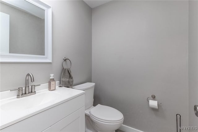 195 Robert Dr, North Tonawanda, NY 14120 - half bath featuring toilet, vanity, and baseboards